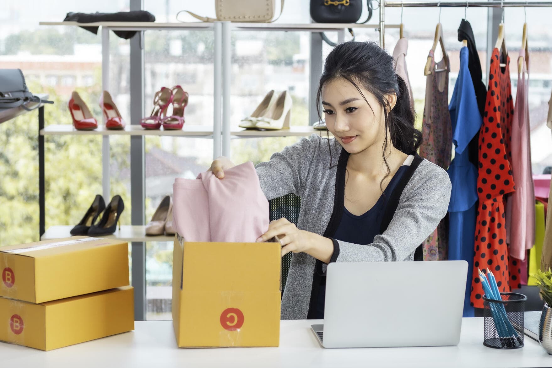 happy-asian-casual-lady-working-startup-small-business-entrepreneur-sme-clothes-shop
